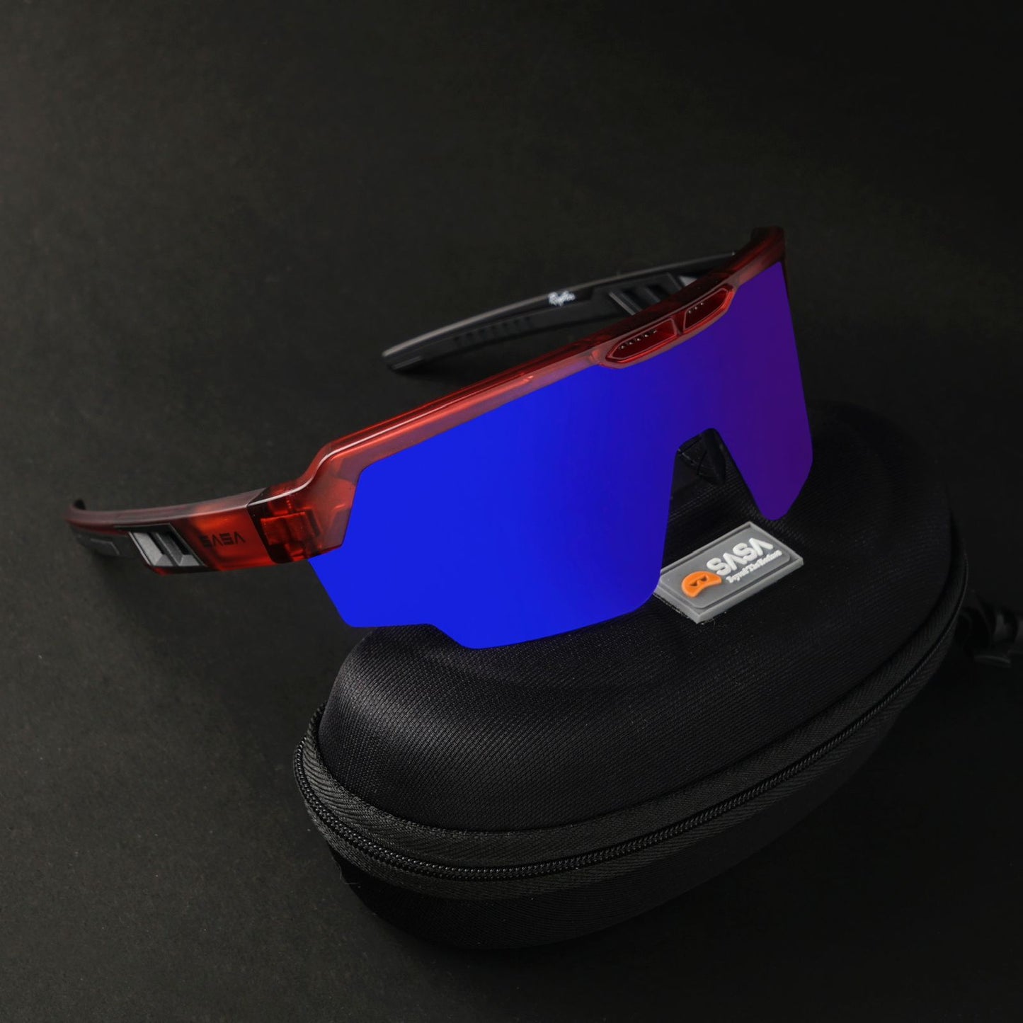 RAPTOR TRANSLUCENT RED FRAME BLUE REVO LENS