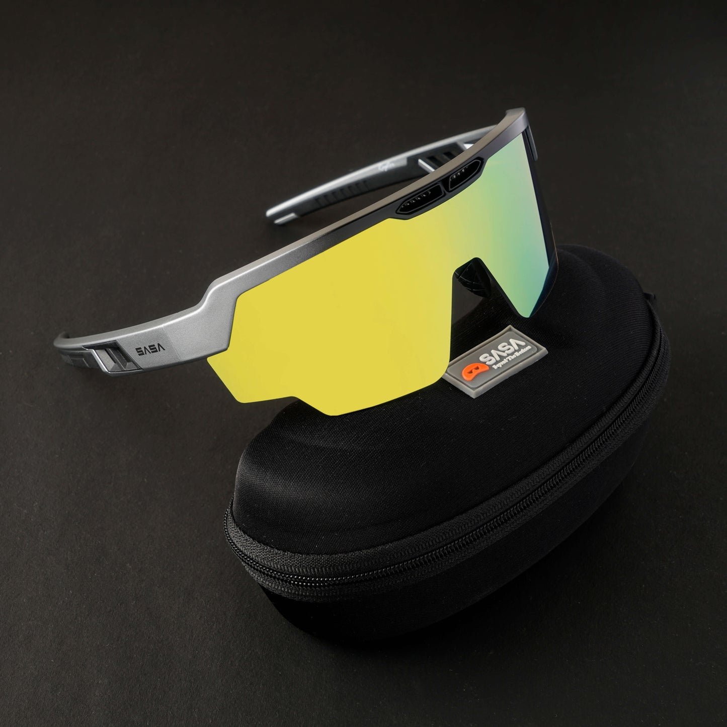 RAPTOR MATTE SILVER/BLACK FRAME YELLOW REVO LENS